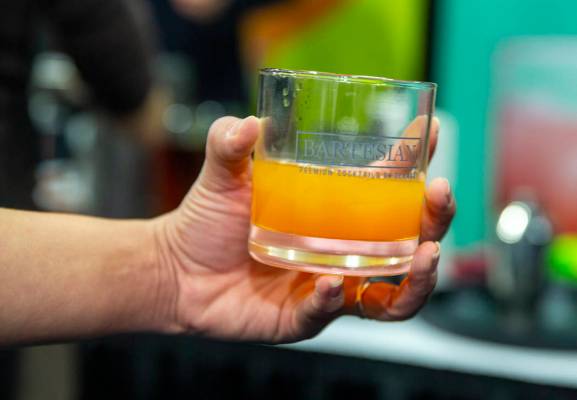 A whisky drink made fresh from the Bartesian premium cocktails on demand machine during the &qu ...