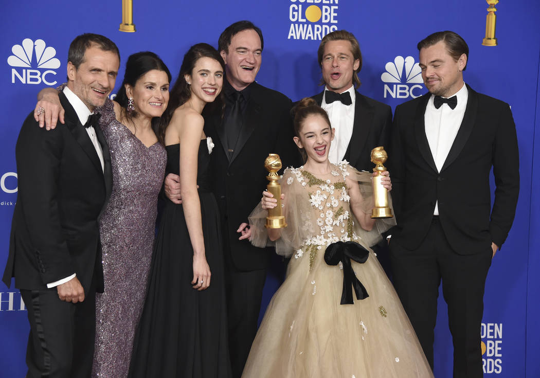 The cast and crew of "Once Upon a Time in Hollywood" pose in the press room with the ...