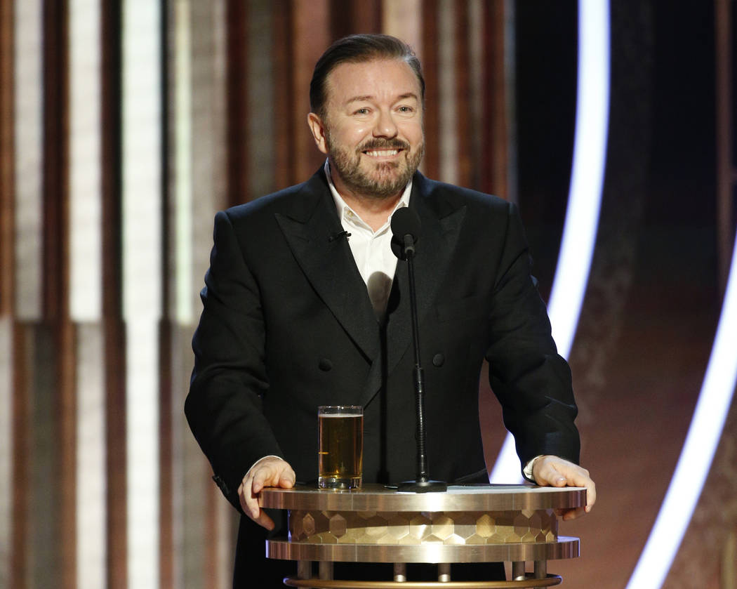 This image released by NBC shows host Ricky Gervais speaking at the 77th Annual Golden Globe Aw ...
