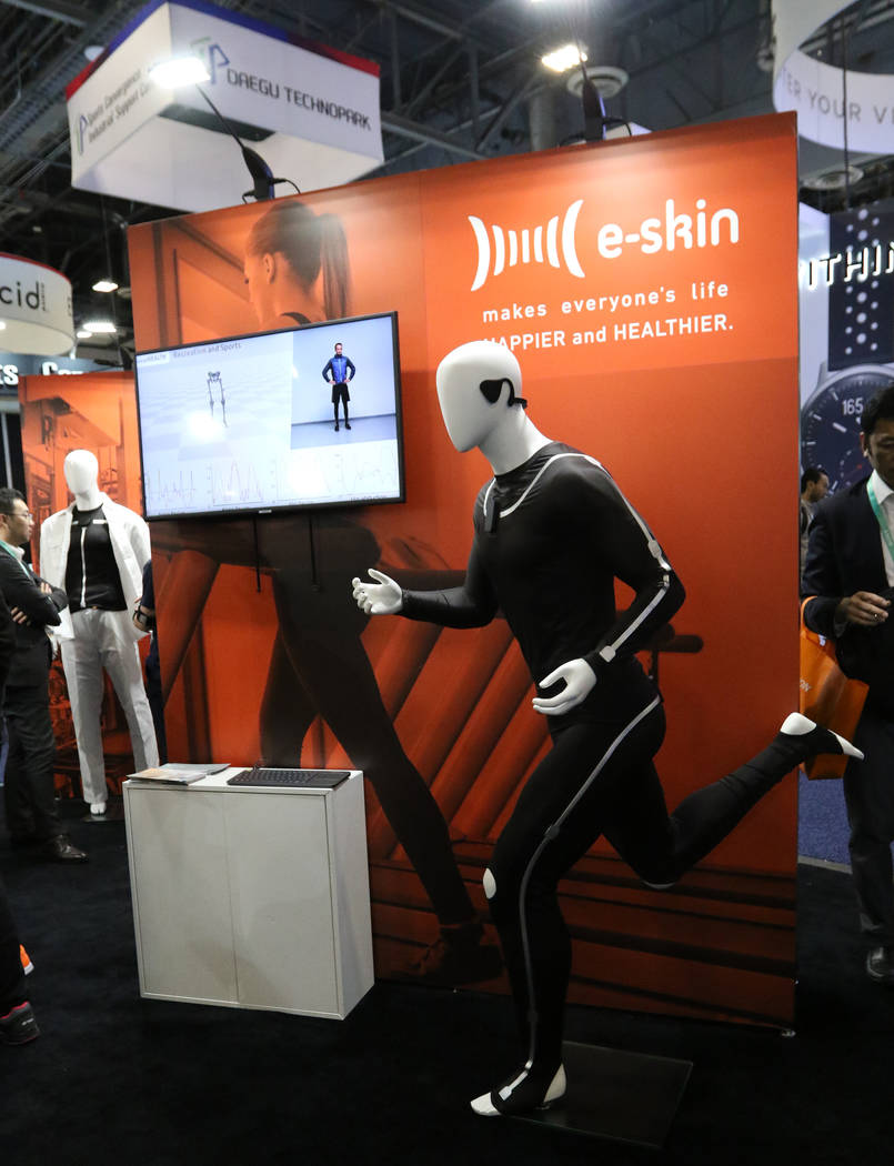 The E-Skin suit, a wearable fitness item, on display at the CES trade show at the Sands Expo Co ...