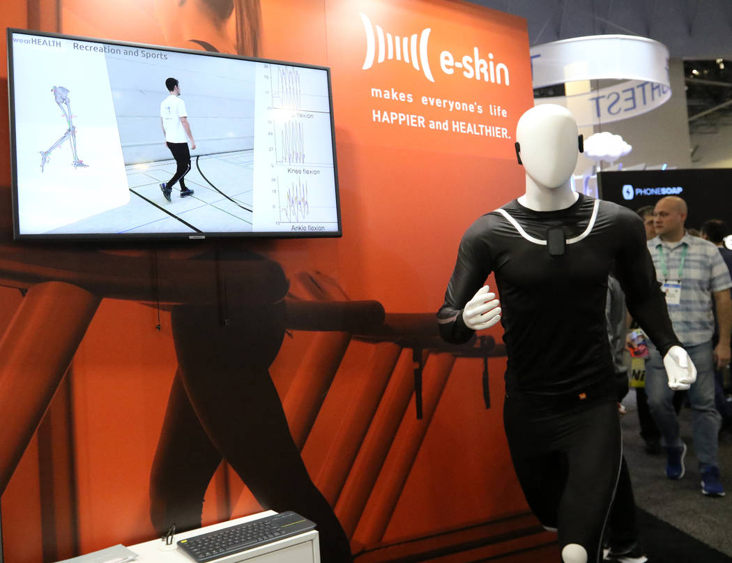 A wearable fitness item, the E-Skin suit, on display at the CES trade show at the Sands Expo Co ...