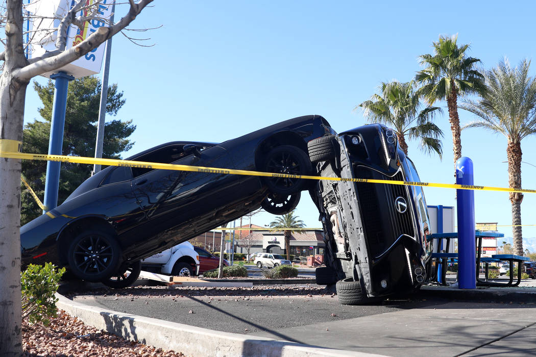 A crash outside a Dutch Bros coffee shop at 590 E. Windmill Lane left one vehicle on its side a ...