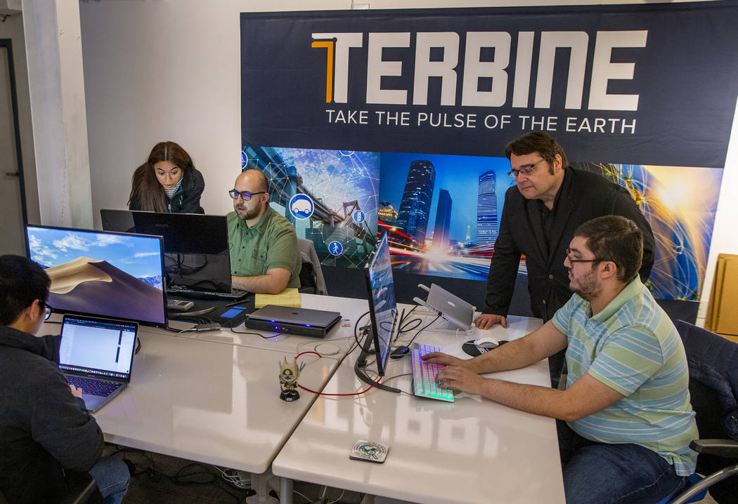 A team from Terbine works together at the International Innovation Center @ Vegas before addres ...