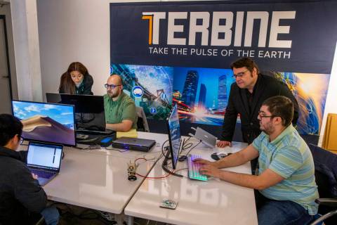 A team from Terbine works together at the International Innovation Center @ Vegas before addres ...