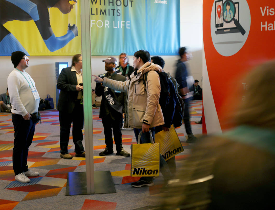 Attendees of CES 2020 fill the Sands Expo the first morning of the convention on Tuesday, Jan. ...