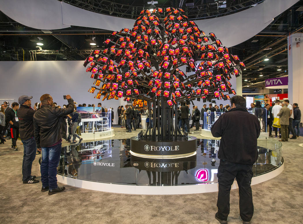 A video screen tree by Royole about their products on display during CES Day 1 in Central Hall ...