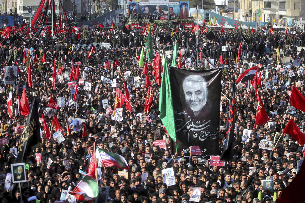 Mourners attend a funeral ceremony for Iranian Gen. Qassem Soleimani and his comrades, who were ...