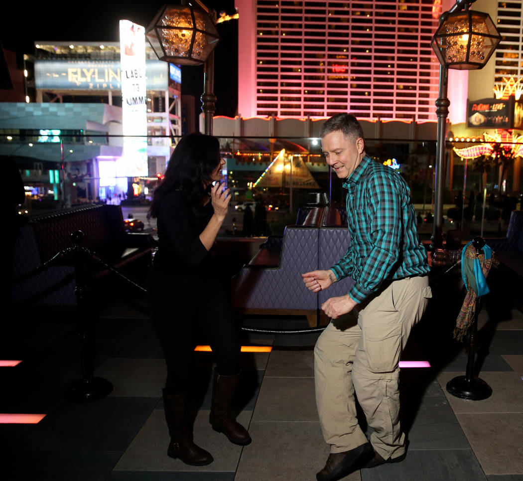 Conventioneers who declined to give their names during the CES 2020 official opening party at O ...