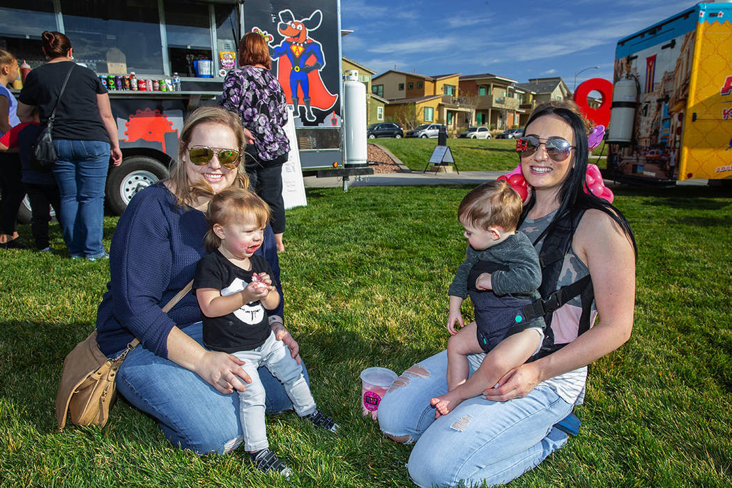 Families enjoyed the food trucks and other activities at Cadence's fifth anniversary party in m ...