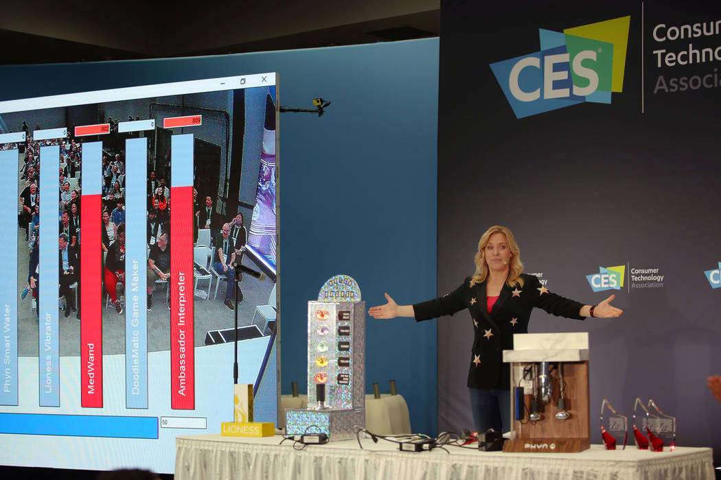Last Gadget Standing host Jennifer Jolly guides the audience in sound metered voting for the wi ...