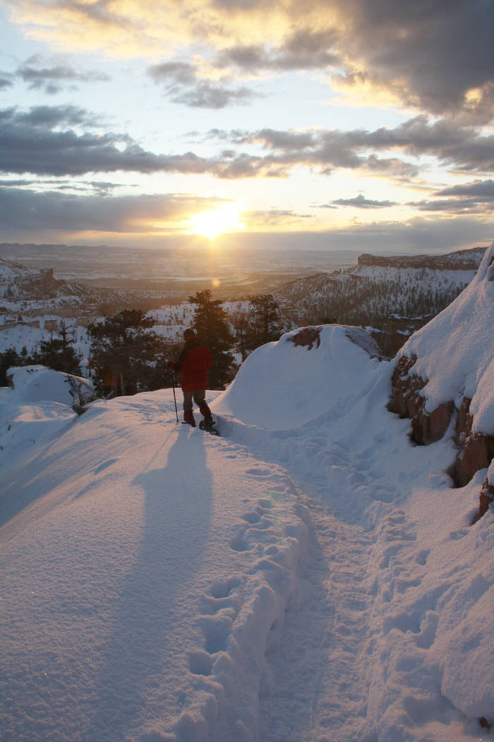 Winter hiking and snowshoeing is allowed below the rim on some of the park’s trails. (De ...