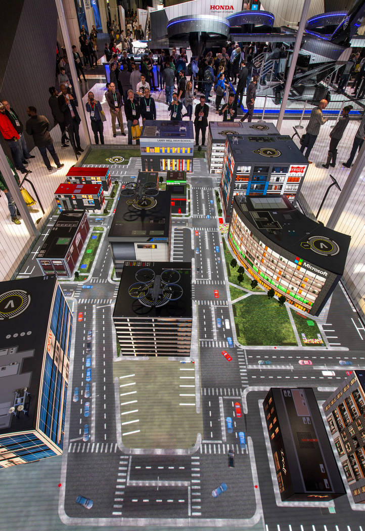 A mock city shows how the new Bell Nexus 4EX air taxi concept's will navigate from place to pla ...