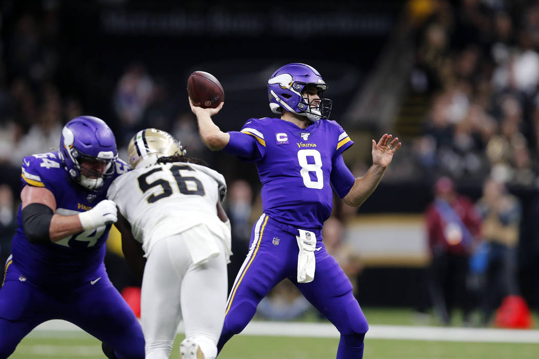 Minnesota Vikings quarterback Kirk Cousins (8) passes under pressure from New Orleans Saints ou ...