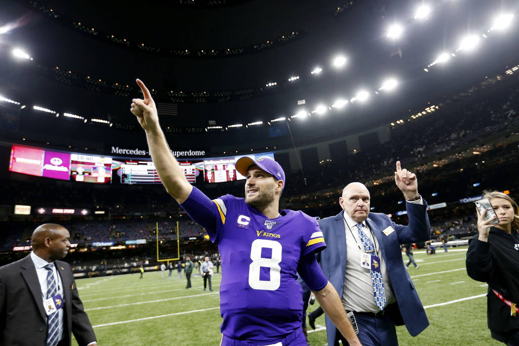Minnesota Vikings quarterback Kirk Cousins (8) reacts as he walks off the field after their ove ...