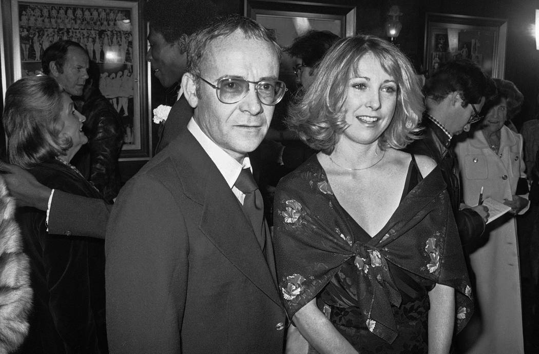 FILE - In this Nov. 15, 1977, file photo, Buck Henry and Teri Garr appear at the opening of the ...