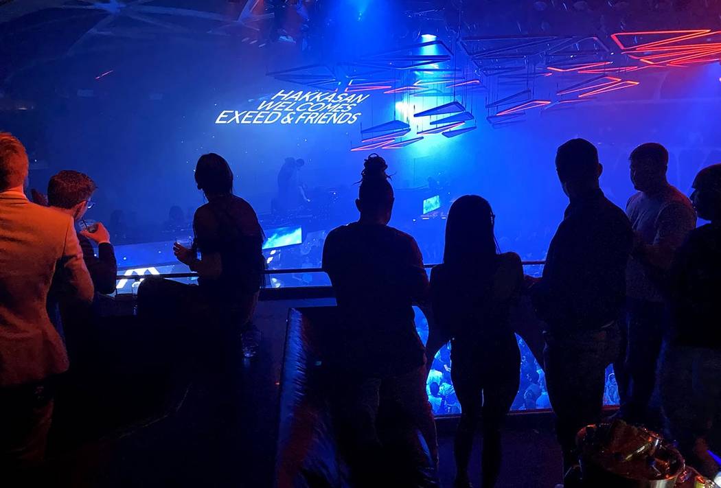 CES conventioneers and clubgoers prepare to watch Tiesto perform during the DreamlandXR Closing ...