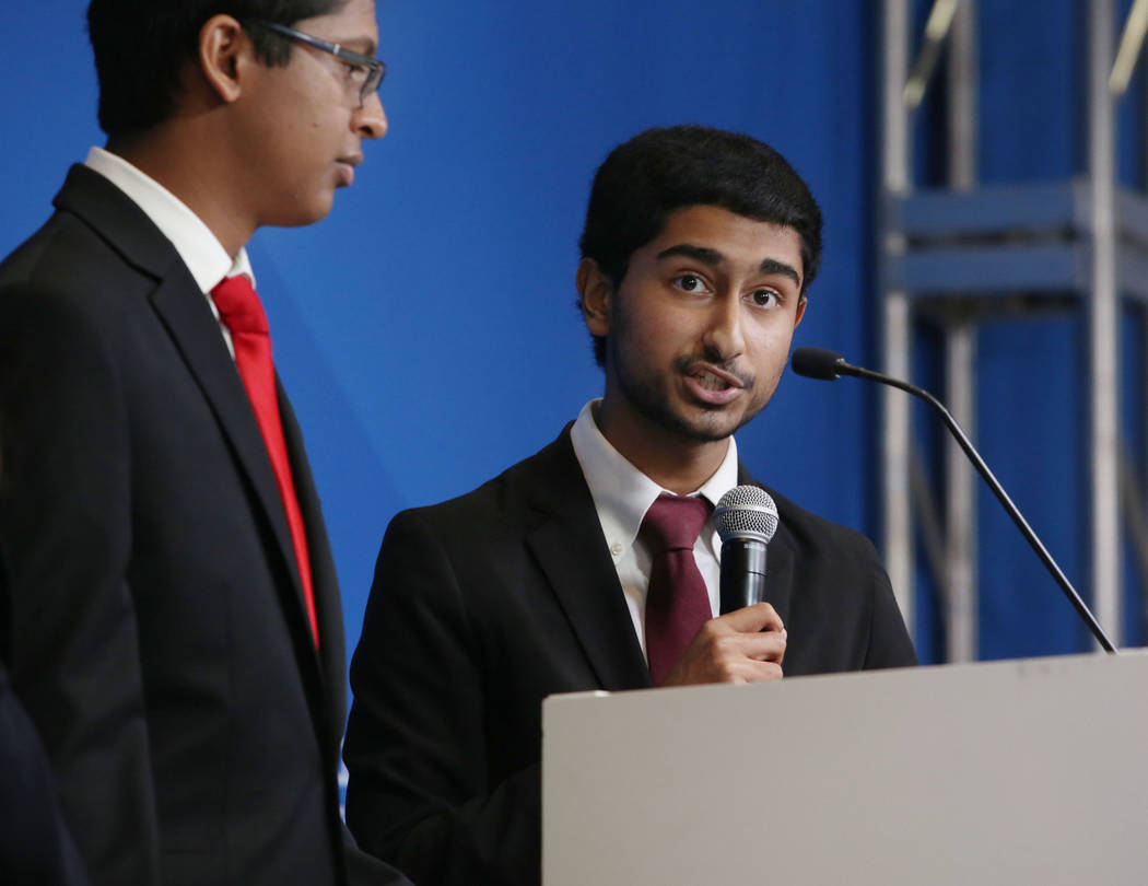 Southwest Career and Technical Academy students Ishaan Raja, left, and Anish Chejerla present t ...