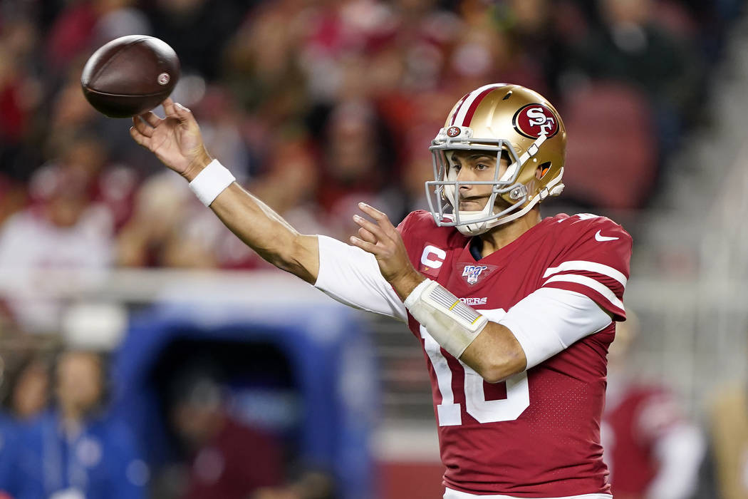 San Francisco 49ers quarterback Jimmy Garoppolo releases a pass against the Los Angeles Rams du ...