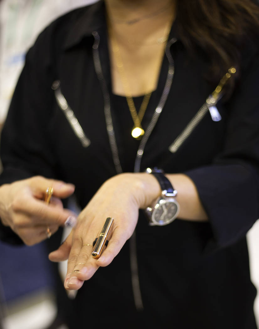 Ti Chang, co-founder of Crave, displays one of the company's vibrator rings on Wednesday, Jan. ...