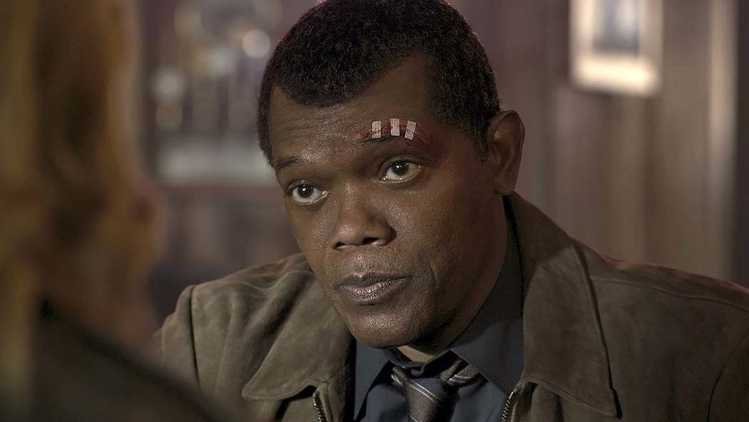 This image released by Disney-Marvel shows Samuel L. Jackson as a younger Nick Fury in a scene ...