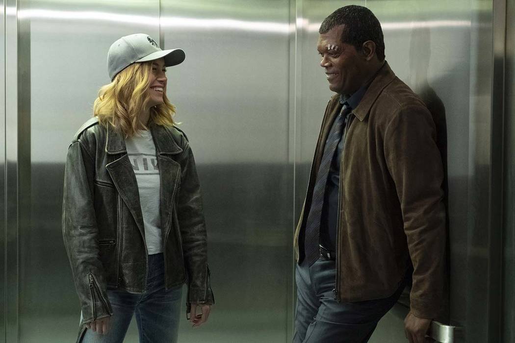 This image released by Disney-Marvel shows Samuel L. Jackson, right, with Brie Larson on the se ...