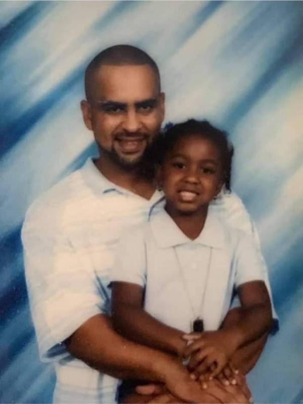 Randall Johnson, 49, poses with his daughter, Makayla Johnson, who is now 18 years old. Family ...