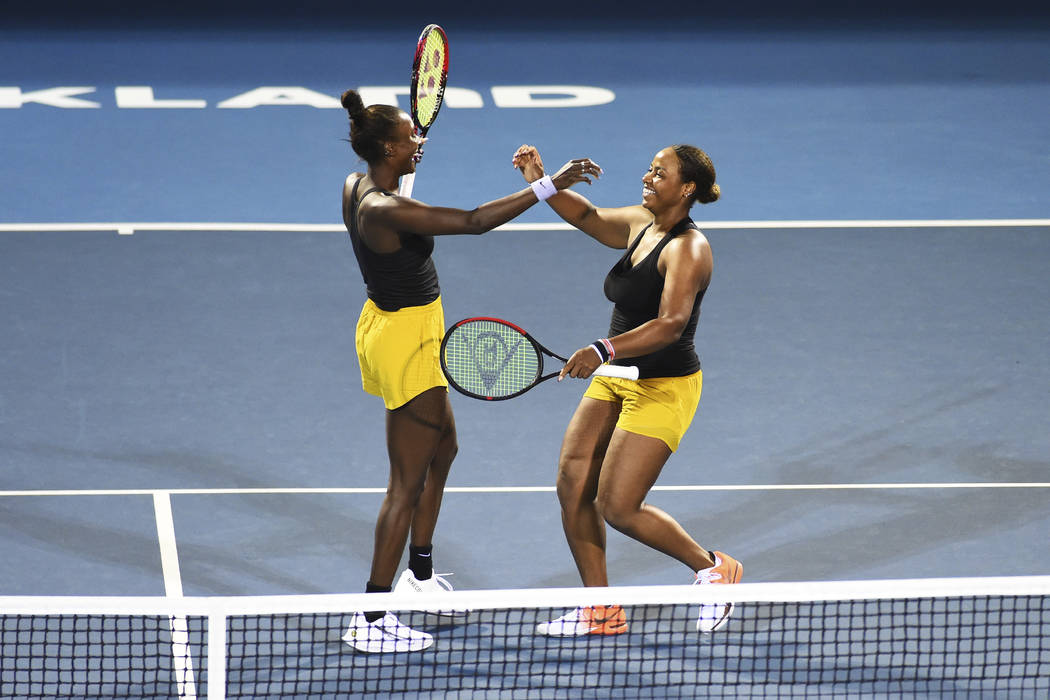 United States player Asia Muhammad, left, and Taylor Townsend from the United States celebrates ...
