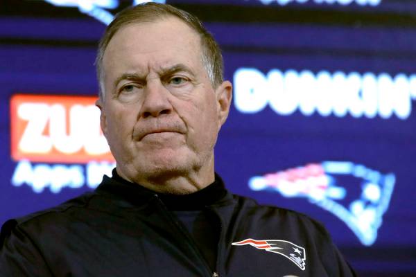 New England Patriots head coach Bill Belichick speaks to the media following an NFL football ga ...