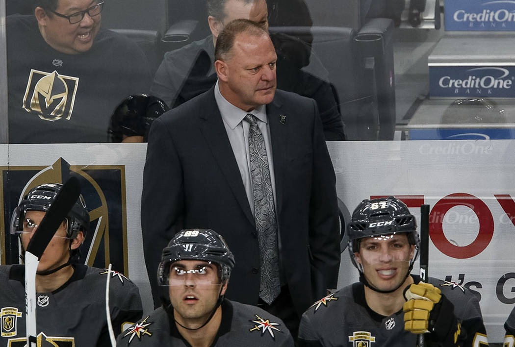 Vegas Golden Knights head coach Gerard Gallant watches his team as play continues during the fi ...