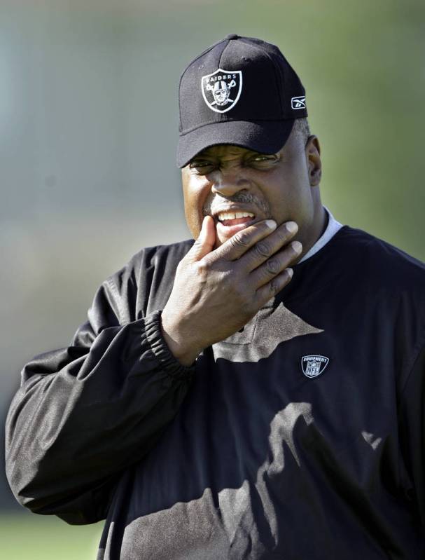 Oakland Raiders new head coach Art Shell watches the Raiders in training camp in Napa, Calif., ...