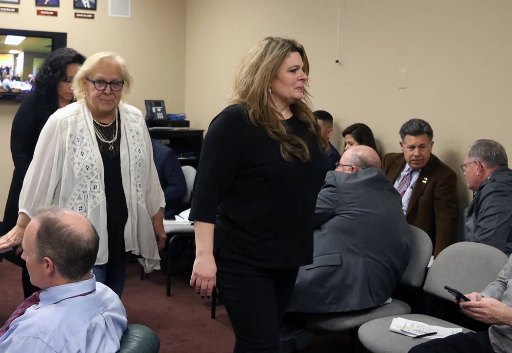 Melanie Bernstein Chapman, right, general counsel of the Nevada Board of Dental Examiners, leav ...