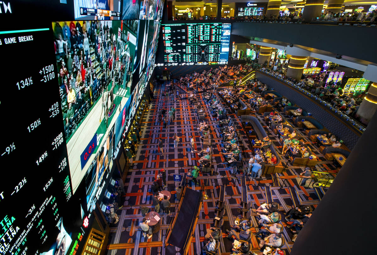 The Circa Sportsbook is packed with fans during the first day of March Madness on Thursday, Mar ...