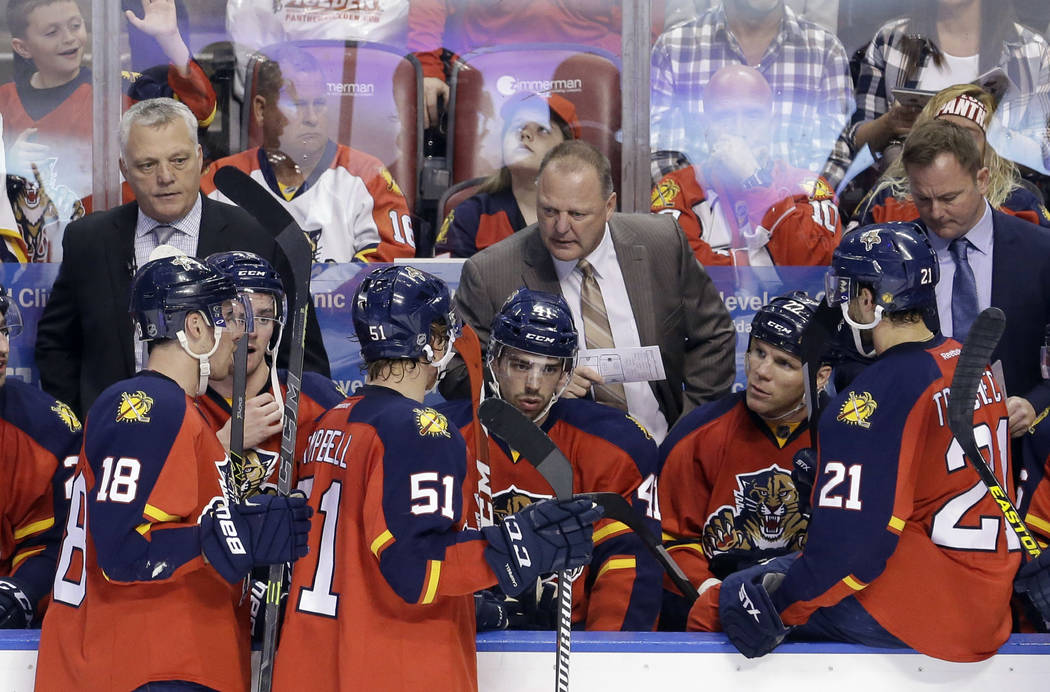 Florida Panthers head coach Gerard Gallant talks to the players during a timeout during the thi ...