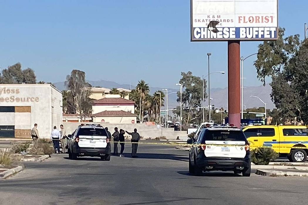 Las Vegas police investigate an officer-involved shooting on Spring Mountain Road near Rainbow ...