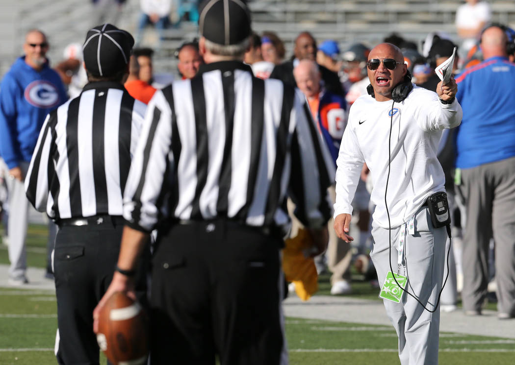 Bishop Gorman head coach Kenny Sanchez draws an unsportsmanlike penalty after yelling at the re ...