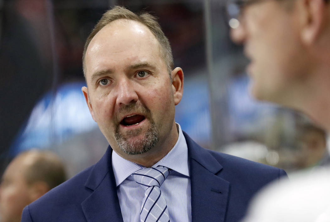 FILE - In this Oct. 26, 2018, file photo, then-San Jose Sharks' head coach Peter DeBoer directs ...