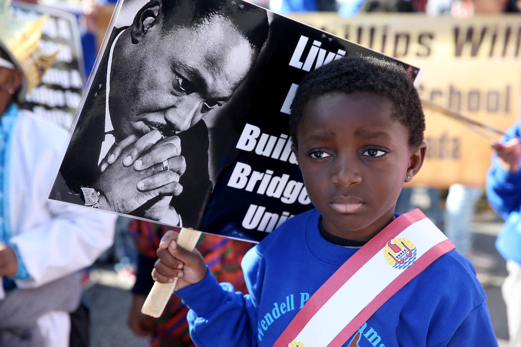 Jayce Jordan, 4, prepares to march with the Williams Elementary school entry in the 37th Annual ...