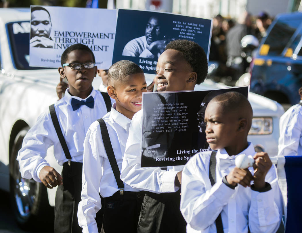 Students from Wendell Williams Elementary School march in downtown Las Vegas during the Martin ...