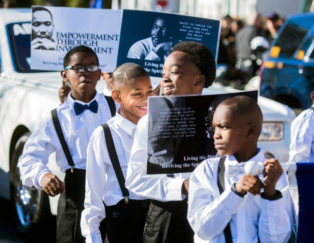 Students from Wendell Williams Elementary School march in downtown Las Vegas during the Martin ...