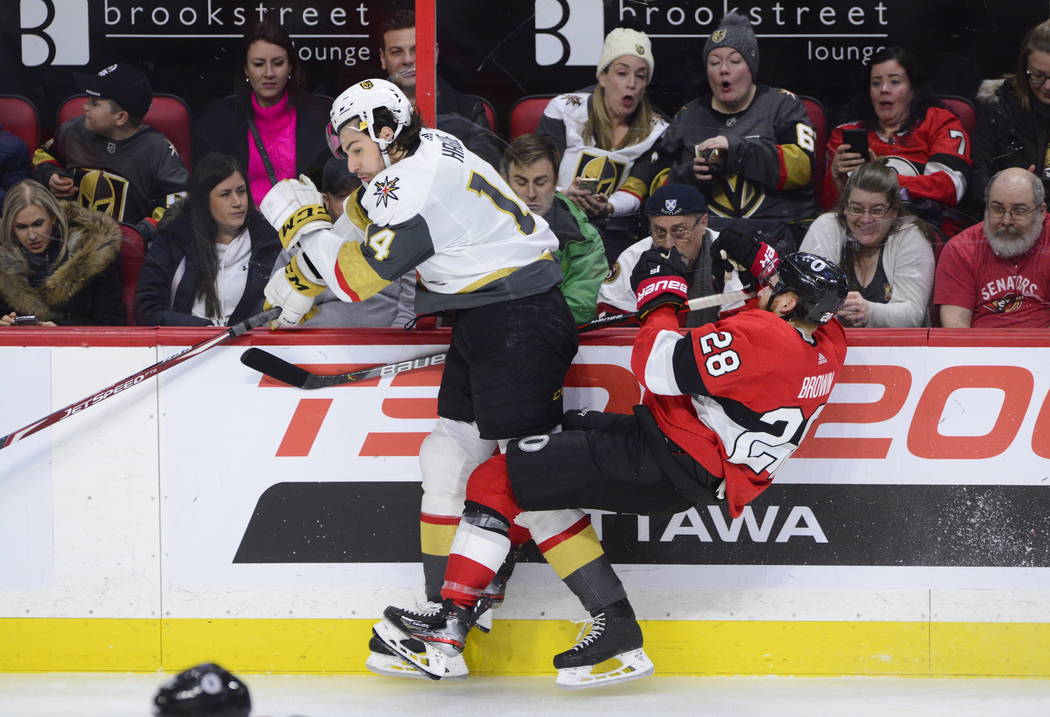 Fans react to Vegas Golden Knights defenseman Nicolas Hague (14) hitting Ottawa Senators right ...