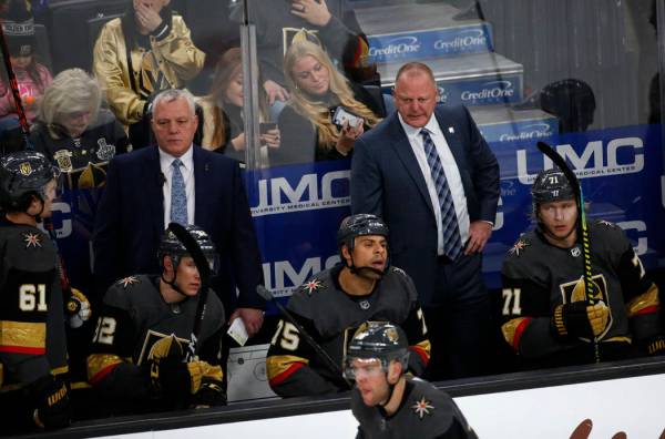 Vegas Golden Knights head coach Gerard Gallant, right, and assistant coach Mike Kelly, left, ar ...