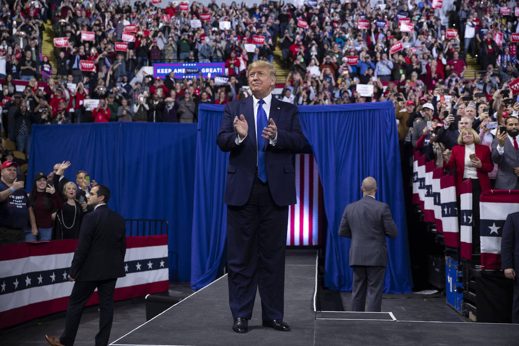 President Donald Trump arrives at UW-Milwaukee Panther Arena to speak at a campaign rally, Tues ...