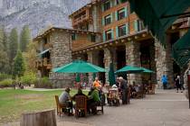 FILE - In this Oct. 24, 2015, file photo, people dine outside the Ahwahnee hotel in Yosemite Na ...