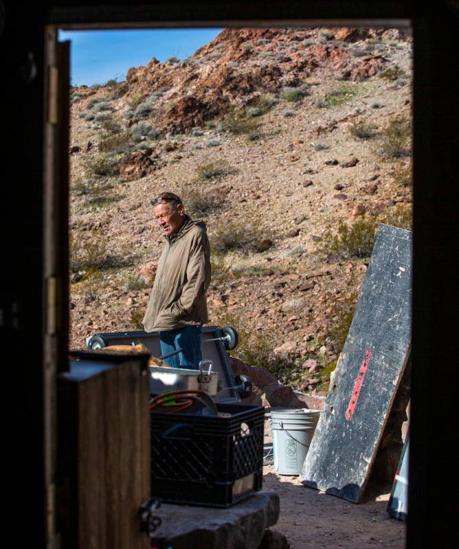 Richard Roman continues to clean out his cave after being evicted by Boulder City in the hills ...