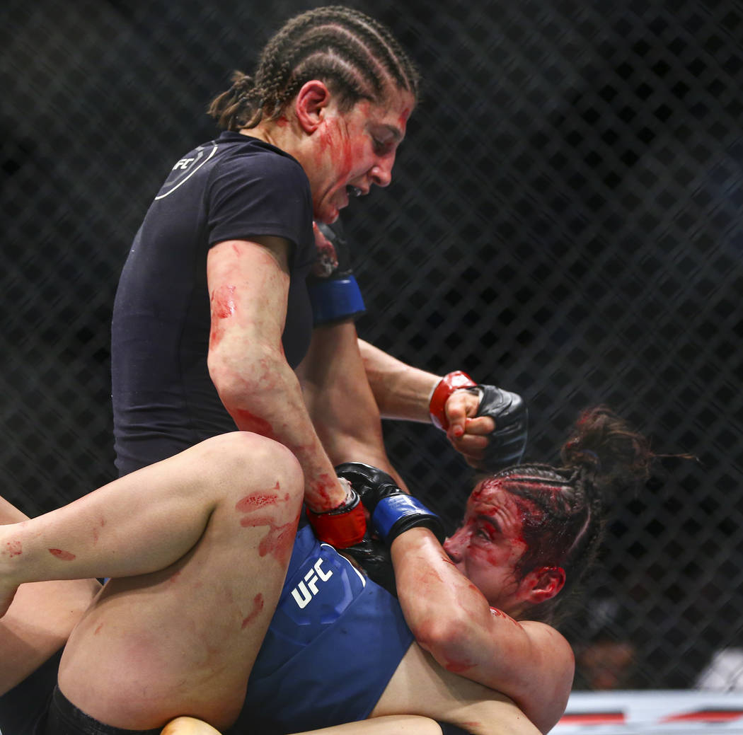 Roxanne Modafferi, left, fights Maycee Barber during their flyweight bout at UFC 246 at T-Mobil ...