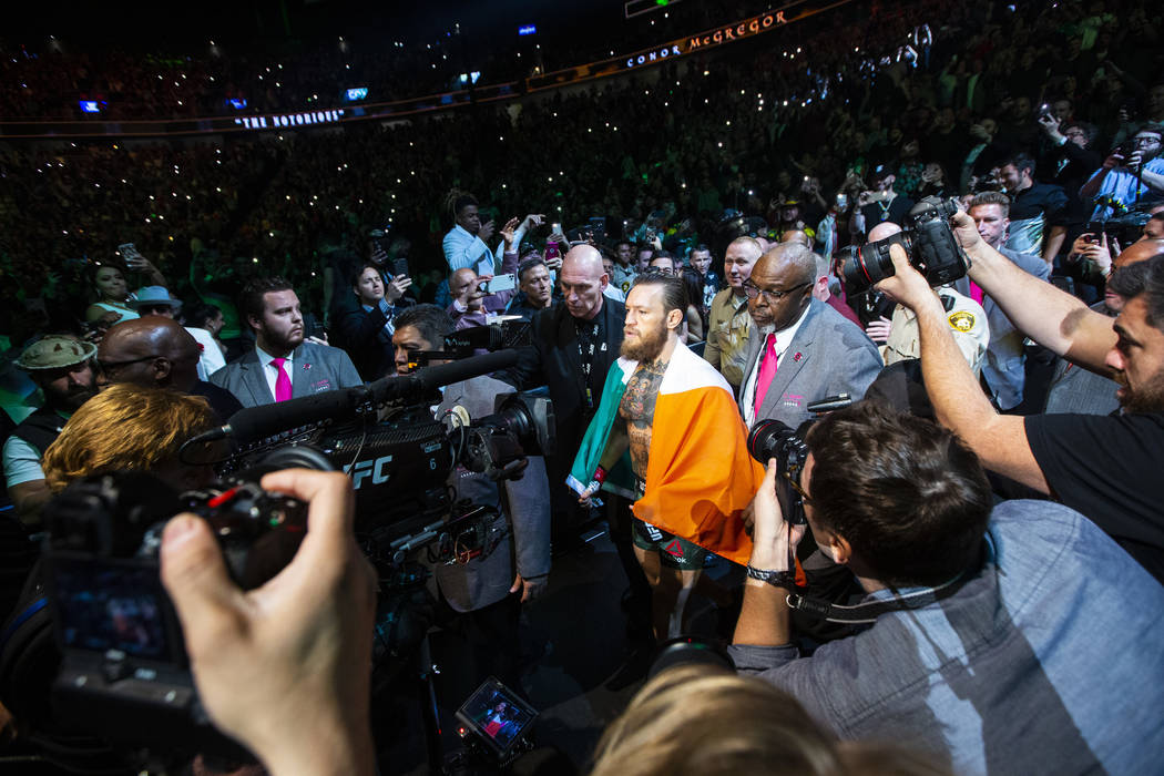 Conor McGregor enters the arena for his fight against Donald "Cowboy" Cerrone at UFC ...