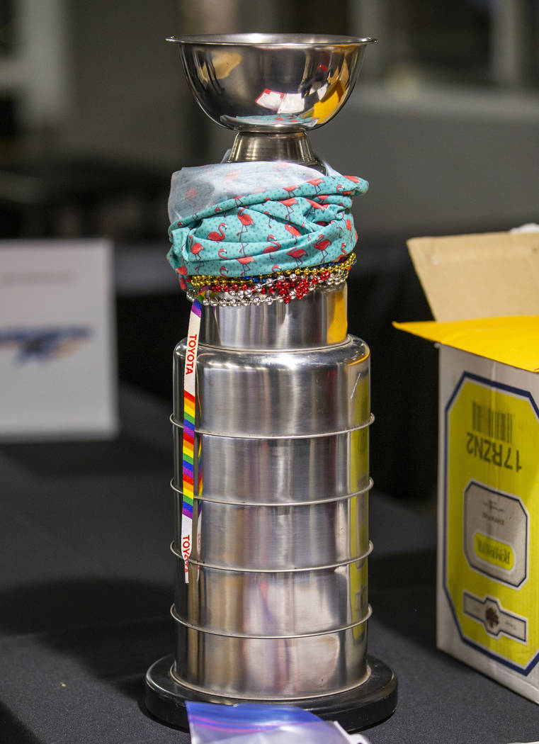 The winners trophy sits on the check-in table during the Sin City Classic hockey tournament at ...