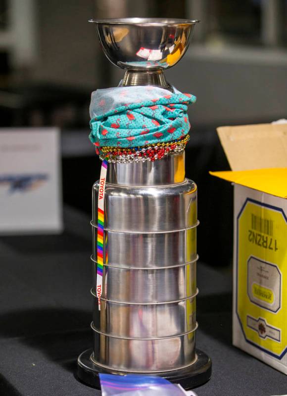 The winners trophy sits on the check-in table during the Sin City Classic hockey tournament at ...