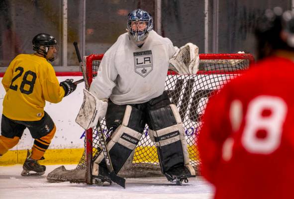 Team Redrum goalie John Hunt looks up the ice while facing the Golden Knights in their semi-fin ...