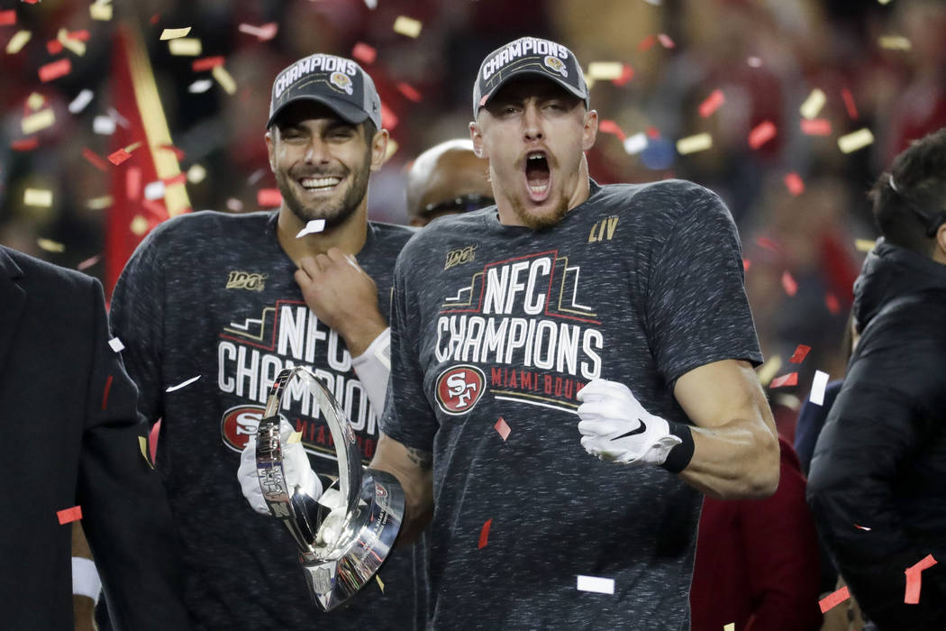 San Francisco 49ers tight end George Kittle, right, and quarterback Jimmy Garoppolo celebrate a ...